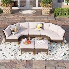 Phi Villa Brown 7 Piece Rattan Steel Wicker Outdoor Sectional 4 Curved Sofas 2 Ottomans 11 Seat With Beige Cushions