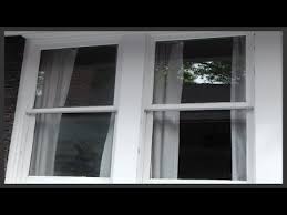 clean hard water spots off windows