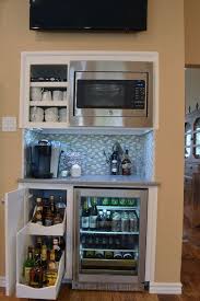 Customized to fit your needs based off dimensions and your mini fridge / wine fridge. Custom Beverage Bar With Slide Out Wine Rack Built In Cooler And Built In Microwave Beveragebar Homer Coffee Bar Home Coffee Bar Design Basement Remodeling