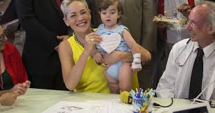 (laird is on the far left and quinn is up front.) Sharon Stone Visits Jerusalem Children S Hospital Photo 6 Cbs News