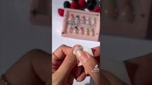 applying press on nails