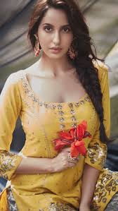 She is famous for her items number (dilbar and kamariya) in hindi and telugu movies. Nora Fatehi Latest Images Glows In A Yellow Outfit Boxofficeindia Box Office India Box Office Collection Bollywood Box Office Bollywood Box Office