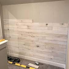 Accent Wall Using White Washed Boards