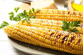 Delicious Grilled Corn On Cob With Grated Parmesan Cheese Stock Image  gambar png