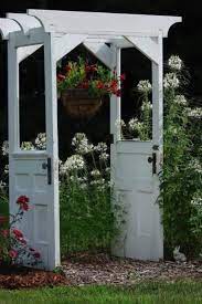 Old Doors Upcycled Into Garden Arbor