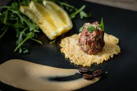 venison meat tartare with wild game