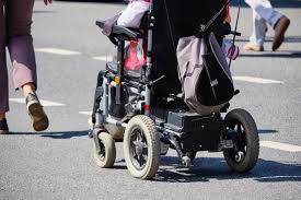 electric wheelchair stock photos