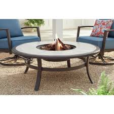 Metal fire pits in a wide range of style and can be made from aluminum, cast iron, copper, steel or stainless steel. Hampton Bay Whitfield 48 In Round Galvanized Steel Wood Burning Fire Pit Table In Dark Brown With Stone Look Tile Top 3022 Cm4 Fp The Home Depot
