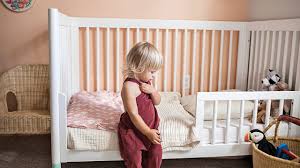 a pillow in your toddler s crib or bed