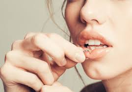 lip piercings cause bad breath