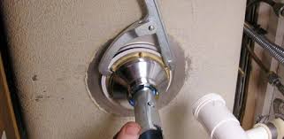remove and install a kitchen sink strainer