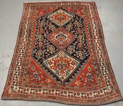 antique tribal qashqai rug of small size