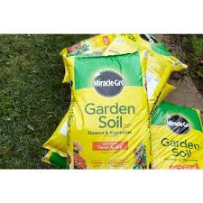 I need to reseed certain parts of the lawn and was wondering if i. Miracle Gro 1 Cu Ft Garden Soil For Flowers And Vegetables 73451430 The Home Depot