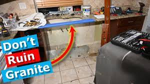 how to remove kitchen sink cabinet