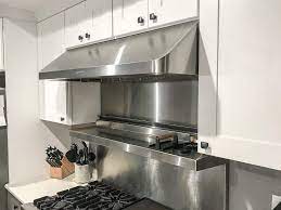 how do you clean a greasy range hood