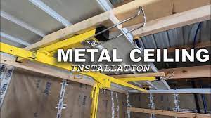 metal ceiling install lifting a