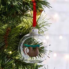 I love celebrating the holidays by ensuring i have the house decked out in the most festive christmas decorations i can find. Wilko Festive Fiesta Encapsulated Sloth Christmas Tree Decoration Wilko