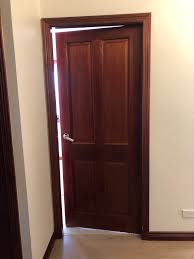 cherry wood doors with white skirting
