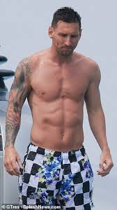 Lionel Messi abs shows off