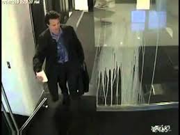 People Walking Into Glass Doors