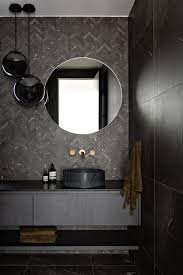 herringbone tile bathroom backsplash