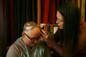 henna artist donates services to cancer