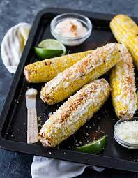 mexican grilled corn garnish with lemon