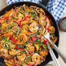 Two Forks In A Skillet Of Cajun Shrimp Pasta With Shrimp, Whole Wheat gambar png