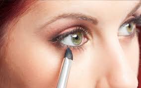 applying makeup for a flawless eye