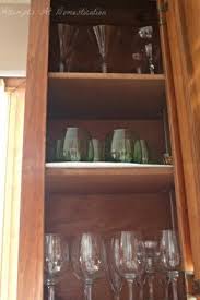 White wine that is stored in clear bottles is especially susceptible to direct sunlight because the glass offers less protection than darker bottles. Wine Glass Cabinets Ideas On Foter