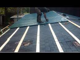 Metal roofing is resistant to fire, rot, and termites. How To Metal Roof For Cheap Metal Roof Over Shingles Metal Roof Installation Roofing Diy