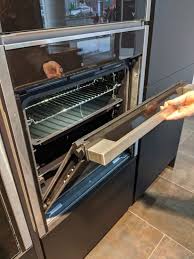 which ovens have slide and hide doors
