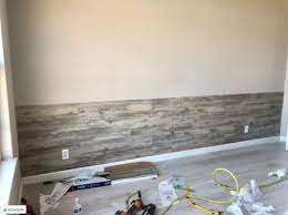 install vinyl plank flooring on wall