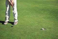 Why do pro golfers take their glove off to putt?