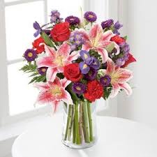 Send funeral flowers & sympathy flower arrangements to anchorage, ak. Stunning Stars Is An Elegant Arrangement With An Array Of Red Roses Pink Lilies And Purple Irises Perfect For Gr Get Well Flowers Flower Delivery Flower Gift