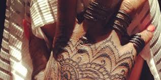 7.pervaya tattoo rihanna — zodiac sign. Rihanna S Henna Inspired Hand Tattoo Celebrity Style News