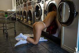 Dominique Gabrielle poses nude as she throws lingerie in a washing machine  - NakedPics