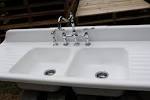 Cast iron double sink with drainboard
