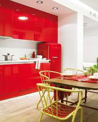 Red accents for modern kitchen design and decor, striped floor rug with white and red stripes, lids and apron in red colors. 22 Ideas To Create Stunning Red And White Kitchen Design