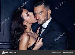 Sensual young woman licking her handsome, elegant lover Stock Photo by  ©majdansky 187441192