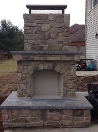 Outdoor Fireplace With Stone Veneer