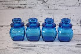 vintage set of 4 glass blue canisters