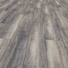 What are some popular product styles within gray laminate wood flooring? Kronotex Exquisite Plus 8mm Harbour Grey Oak Laminate Flooring D3572 Leader Floors