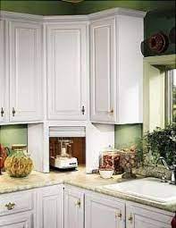 Create a storage area for your appliances that matches your existing wood cabinets. New Kitchen Storage Corner Appliance Garage 70 Ideas Corner Kitchen Cabinet Kitchen Corner Kitchen Corner Storage