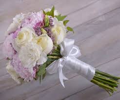 To tie your arrangement, hold the bouquet in one hand and arrange the stems in a spiral, always in the same direction. Diy Bridal Bouquet 12 Steps With Pictures Instructables