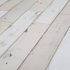 White laminate flooring create the illusion of space by laying white laminate flooring throughout your home, the perfect shade to brighten up small rooms and create neutral interiors. Krono Oak Brave White Laminate Flooring 8mm V Groove