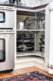 how-do-you-organize-pots-and-pans-in-a-corner-cabinet