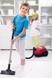 Maximize closet space in kids rooms. Kids Cleaning The Room Boy Using A Vacuum Cleaner Stock Photo Picture And Royalty Free Image Image 12477536