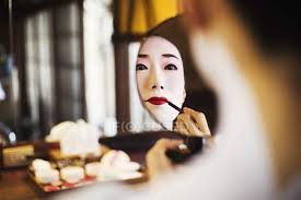 geisha or maiko with a hair and make up
