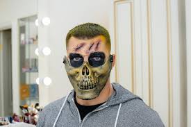 creepy makeup in the form of a skull